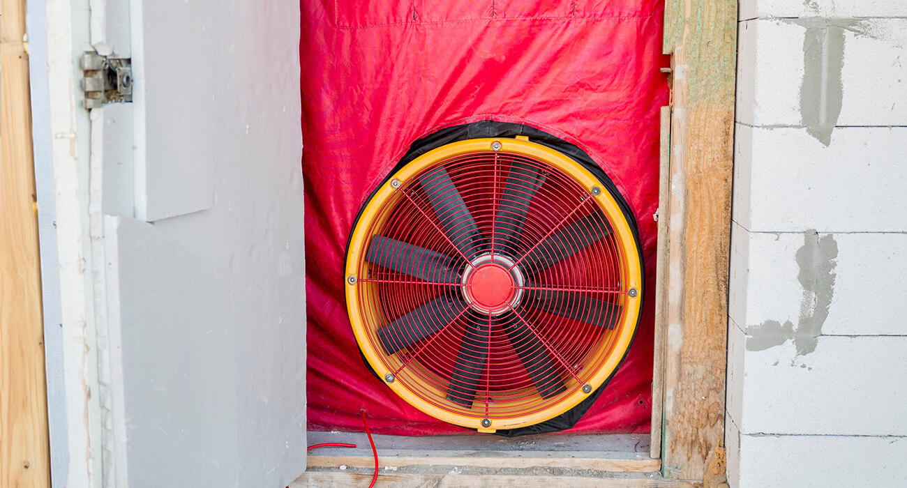 Blower Door Testing Before Drywall at San Rufo Homes: Ensuring Energy Efficiency
